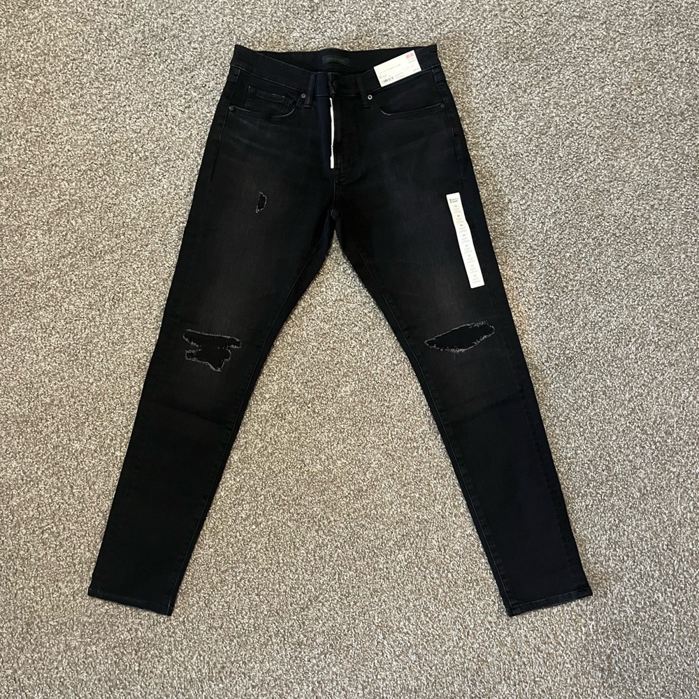 Uniqlo Men's Black Skinny Jeans with Distressed Knees